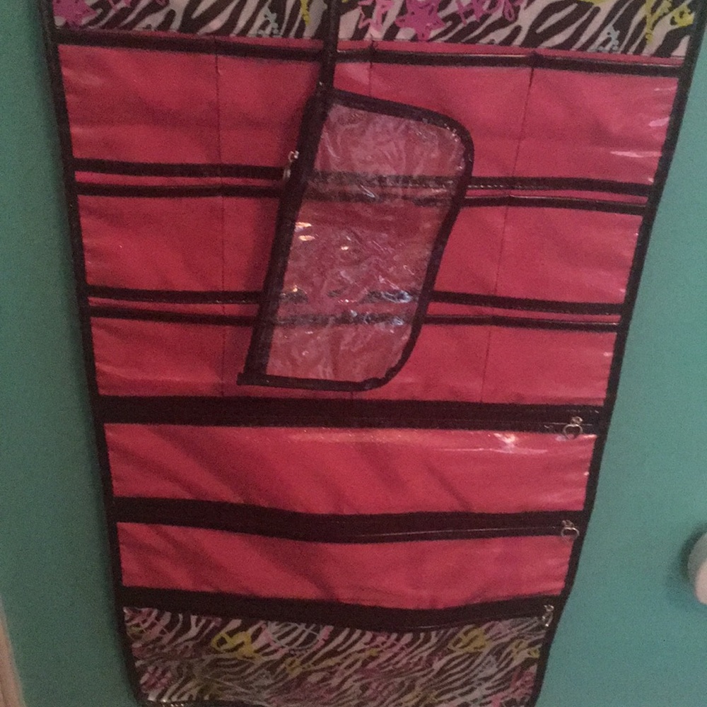 Jewelry and makeup hanging holder